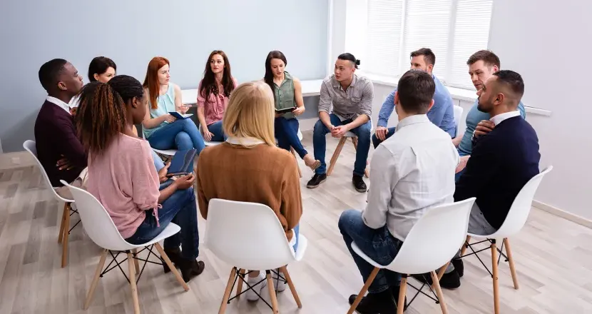 Social Worker Leading Group Discussion